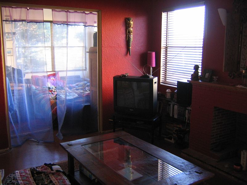 IMG_4163 Romina's lounge, my bedroom is through the curtains.