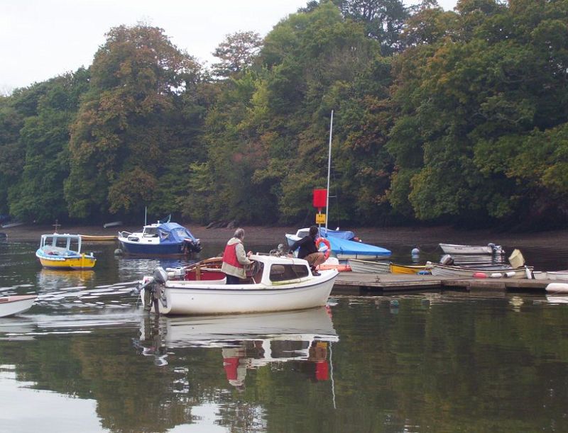 100_4595 After a 12-hour sleep we head down to Stoke Gabrial for a day out on the boat. The boys fetch the boat from the mooring so that the ladies may alight.