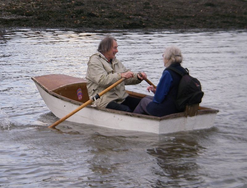 IMGP1539_crop The drastically lowered tide and exposed mud banks are no match for David and his custom built dinghy, as he ferries the ladies safely to shore.
