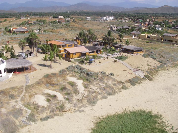 IMGP4878.JPG - Aerial of hotel taken from Matt's kite. Amanda is under the umbrella.